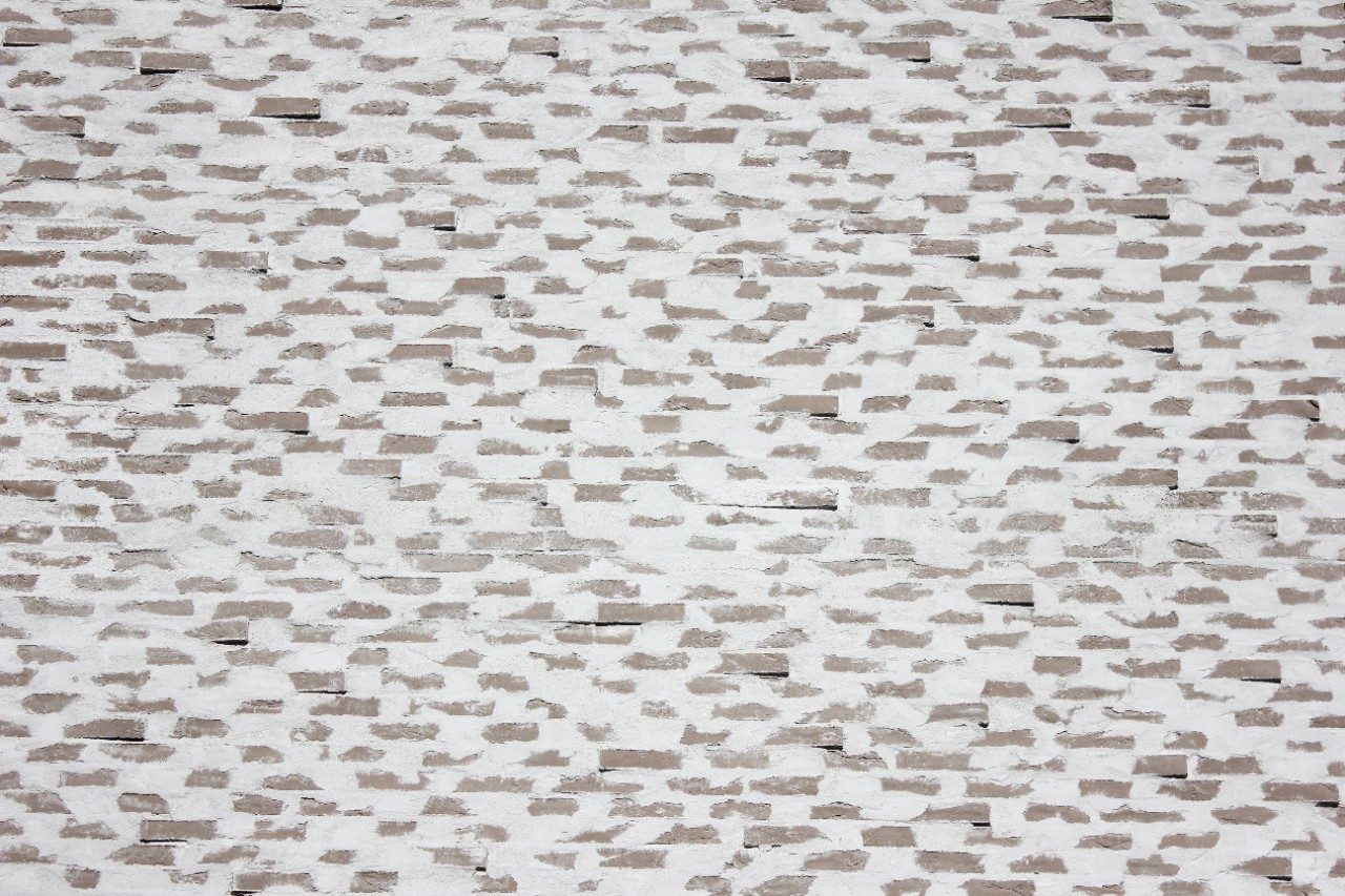 Multistore building with special joint, Supewhite and Tummapellava Retro facing bricks