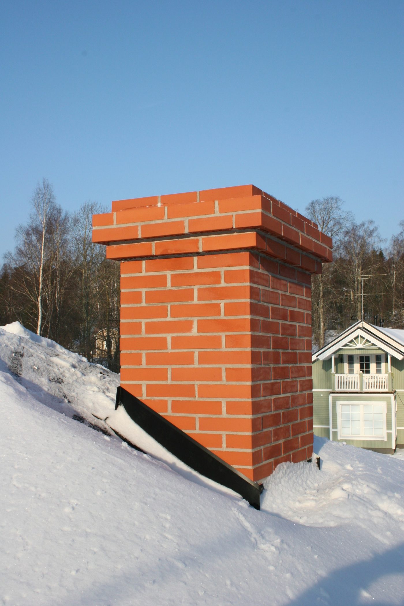 Tiilipiippu ja piippumuuraus