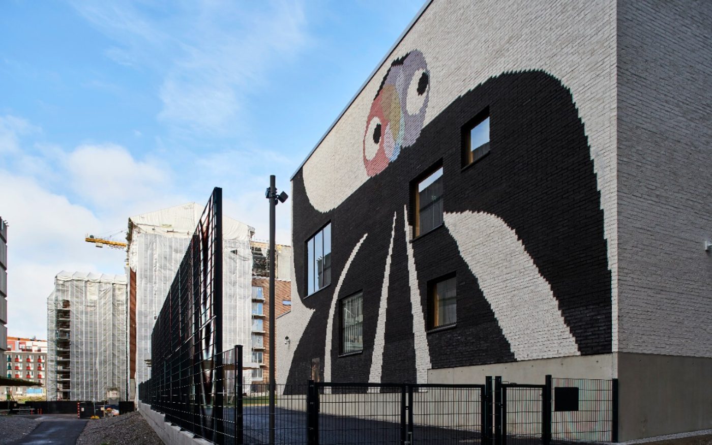 The house of Children in Jätkäsaari Helsinki with glazed art work integrated within the facade