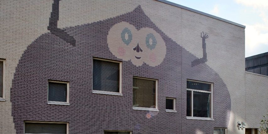 The house of Children in Jätkäsaari Helsinki with glazed art work integrated within the facade