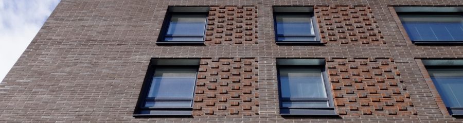 Haakoninlahdenkatu Asuinkerrostalo Ruskonkirjava ja Tervankirjava Makasiini