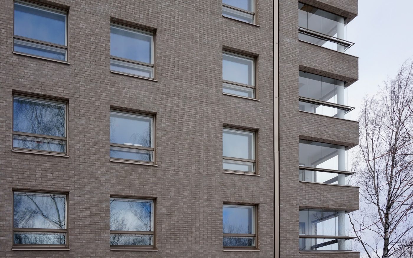 Vallilan salaisuus -asuinkerrostaloissa tiilipalkit