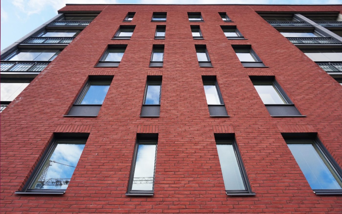 Apartment building Kivisto Vantaa  with red Iltarusko brick facade
