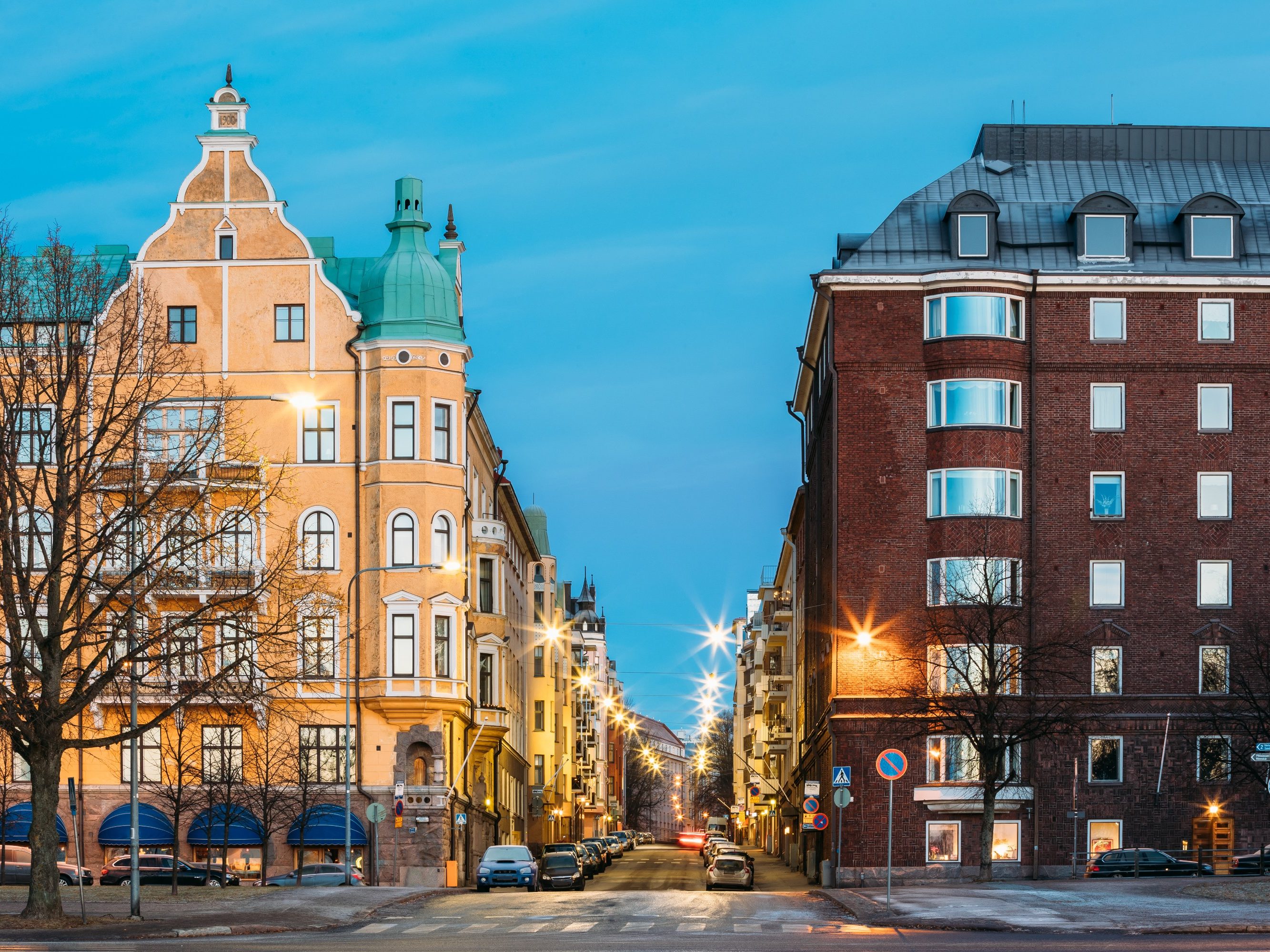 Helsinki, Finland. Residential House Building At Intersection Of Merikatu, Neitsytpolku And Puistokatu Streets In Winter Morning Evening. Ullanlinna Neighbourhood, District