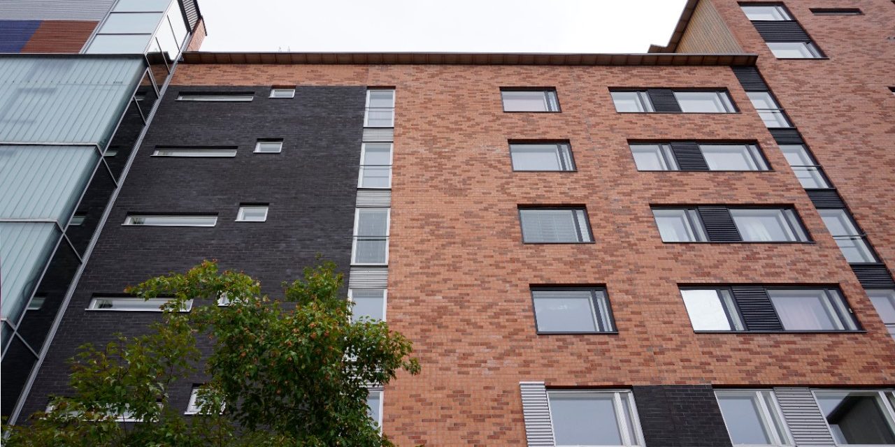                                Aparment building Agronomintie Latokaski black facade with red brick mix