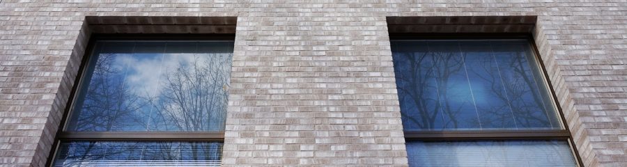 Vallilan salaisuus -asuinkerrostaloissa tiilipalkit